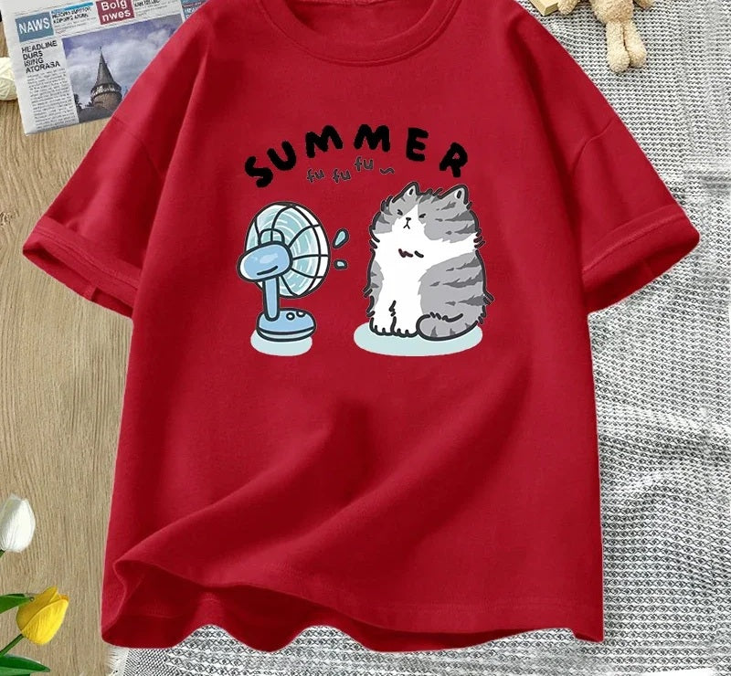 Summer cat and fan tee in red, chest print of a cartoon cat cooling off in front of an electric fan