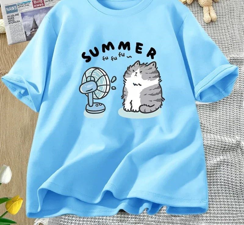 Summer cat and fan tee in sky blue, chest print of a cartoon cat cooling off in front of an electric fan