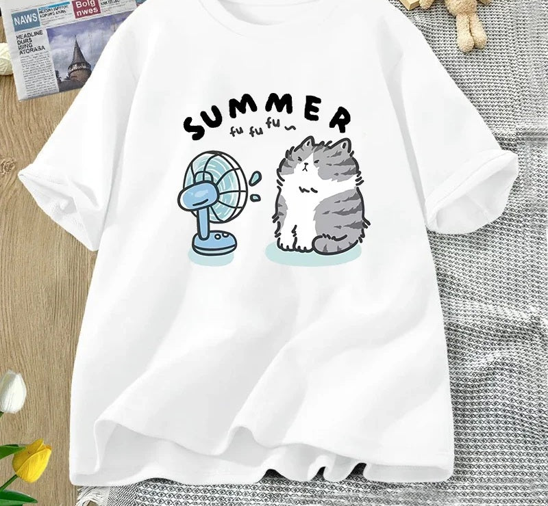 Summer cat and fan tee in white, chest print of a cartoon cat cooling off in front of an electric fan