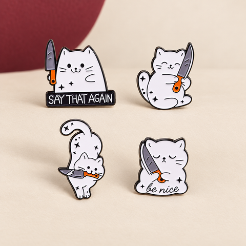 Cat With A Knife Enamel Pin on The Weird Store studio background