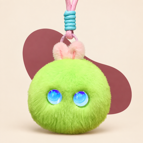 Glowing Eye Pom Pom Charm on The Weird Store studio background