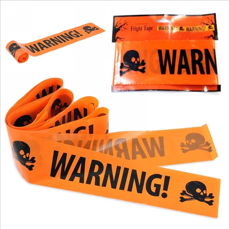 Rolled up orange Halloween warning tape with its packaging