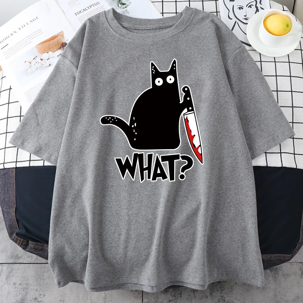 Grey cotton tee printed with a black cat holding a bloody knife above the word WHAT