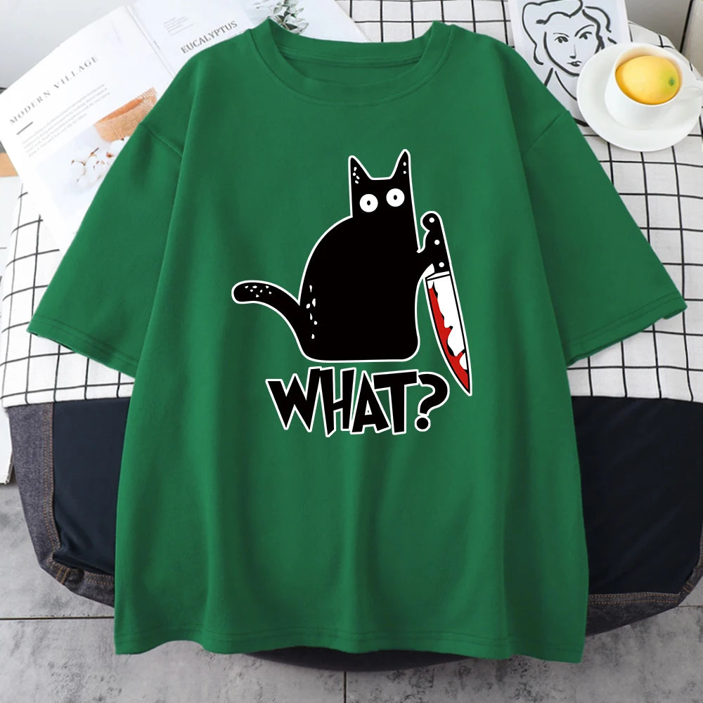 Green cotton tee printed with a black cat holding a bloody knife above the word WHAT