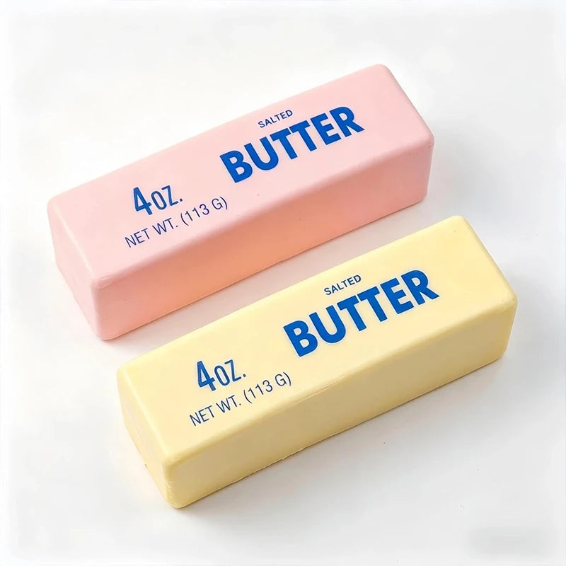 One pink and one yellow squishy butter block side by side