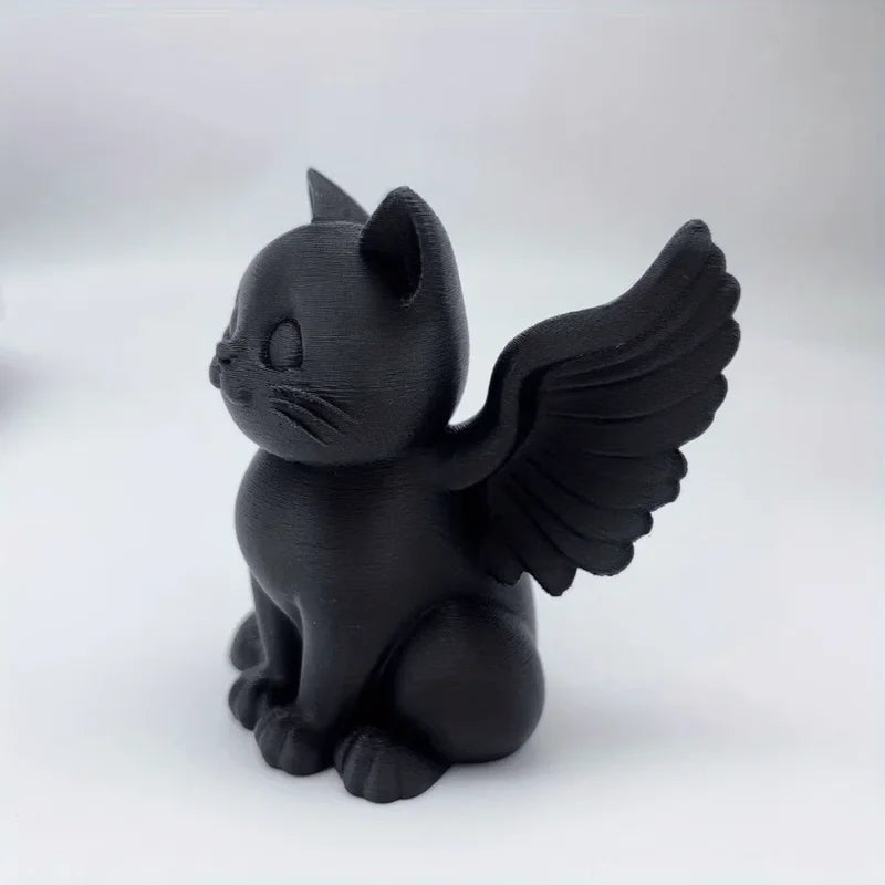Estatua de gato ángel con alas