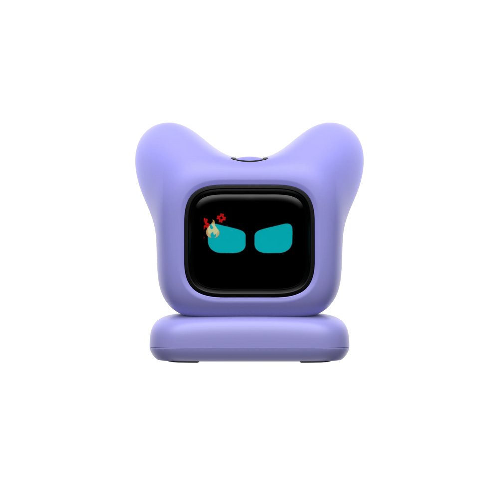 Purple desk robot with two soft ears and a black screen face showing teal eyes, on its moulded base