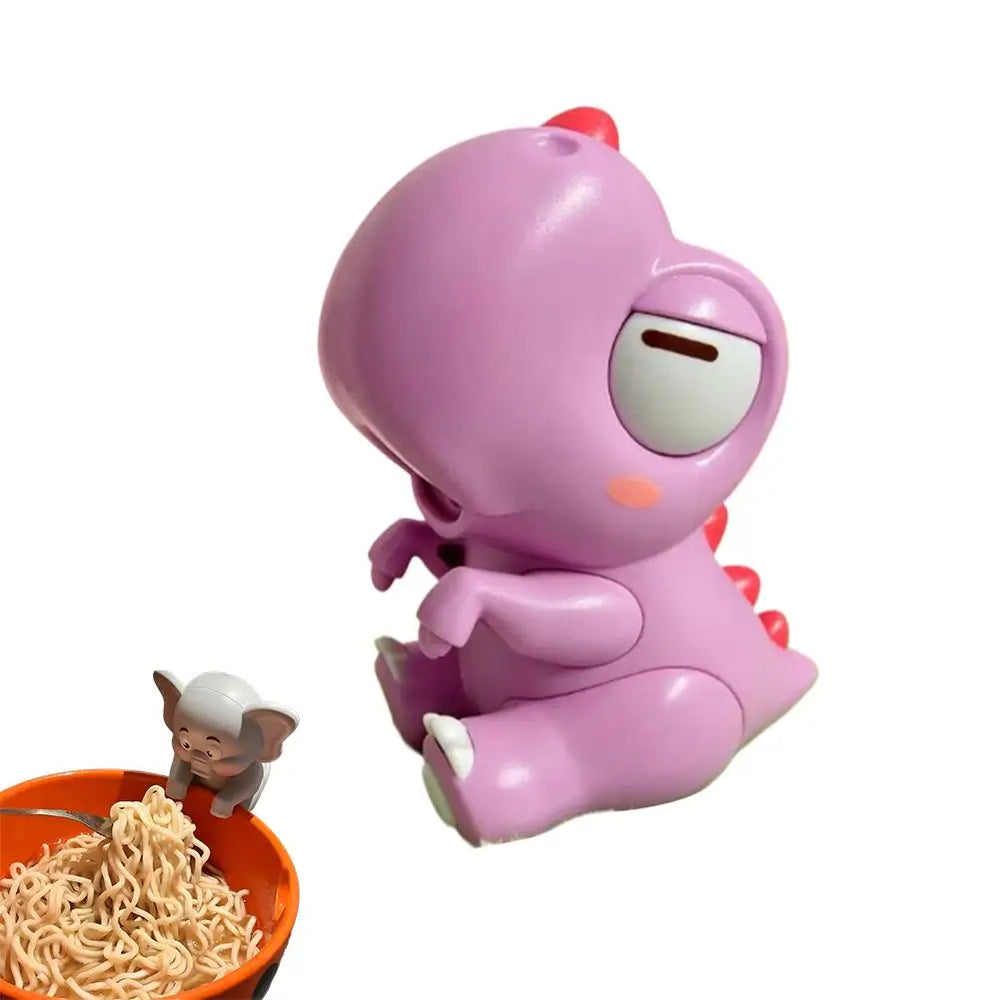 The Pink Dinosaur design photographed alone, seated with a slot in the face as the air outlet and red spines along its back