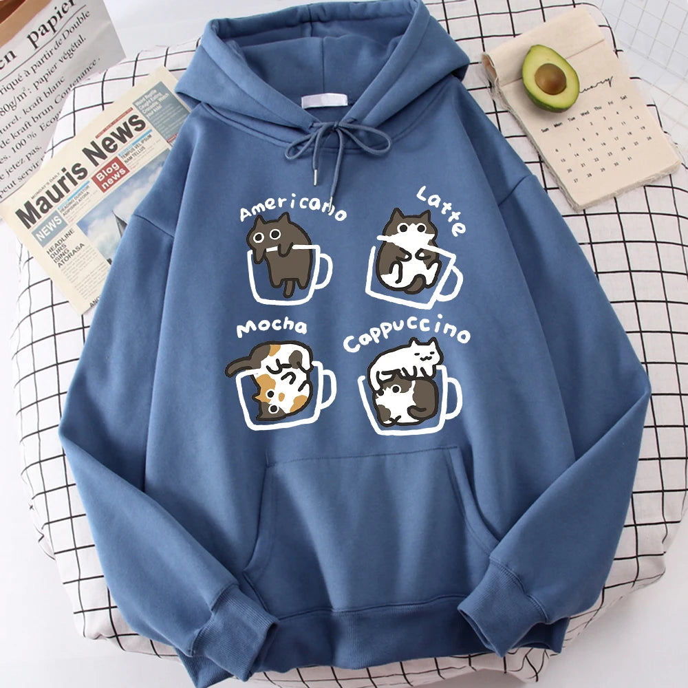 Dusty denim-blue pullover hoodie printed with four cartoon cats in outlined coffee mugs