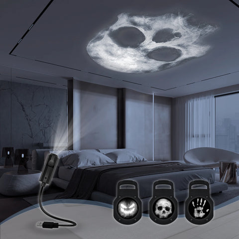 Skull pattern projected on a bedroom ceiling, with the three pattern heads below