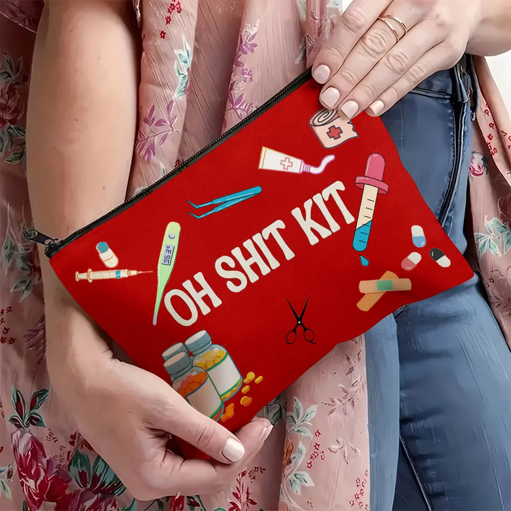 Person holding the red printed zip pouch at waist height
