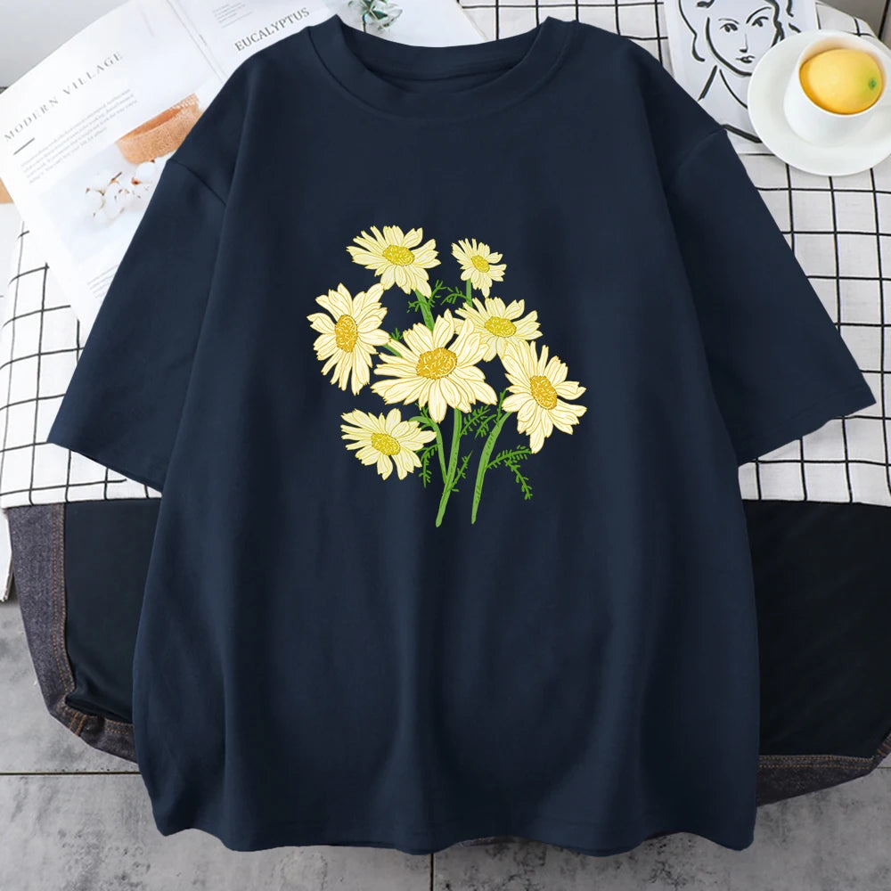 Navy short-sleeve cotton t-shirt printed with a bouquet of yellow and cream daisy-like chrysanthemums