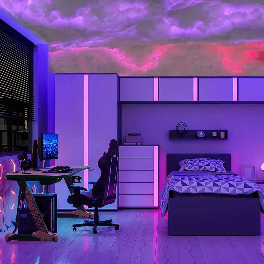 Bedroom and desk lit purple by a cotton cloud along the ceiling