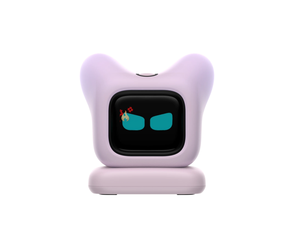 Pink desk robot with two soft ears and a black screen face showing teal eyes, on its moulded base
