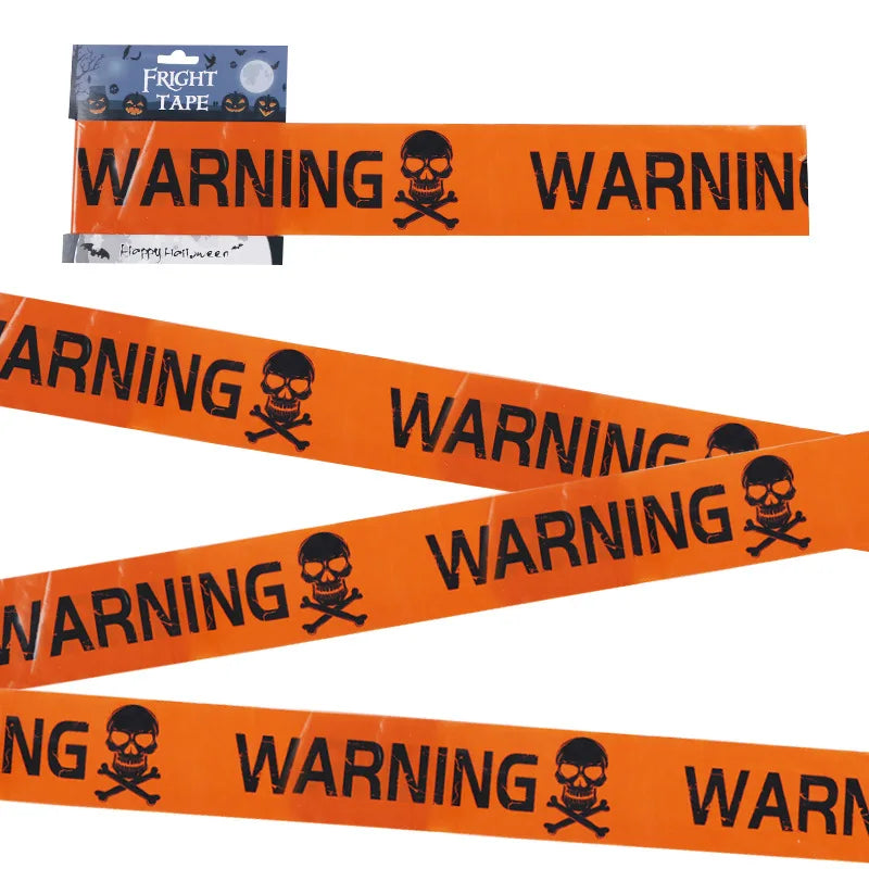 Orange barrier tape printed with skull and crossbones warnings