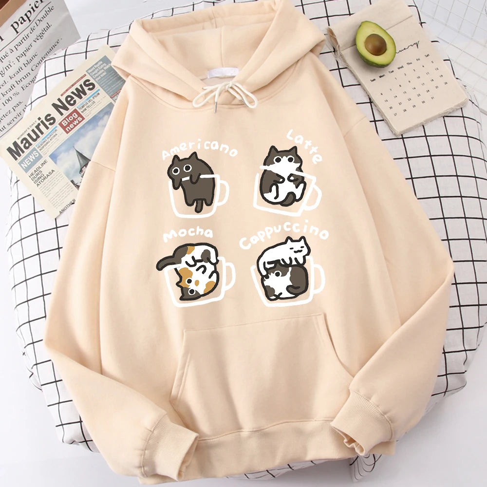 Cream beige pullover hoodie with a front print of four cartoon cats in outlined coffee mugs labelled with coffee drink names