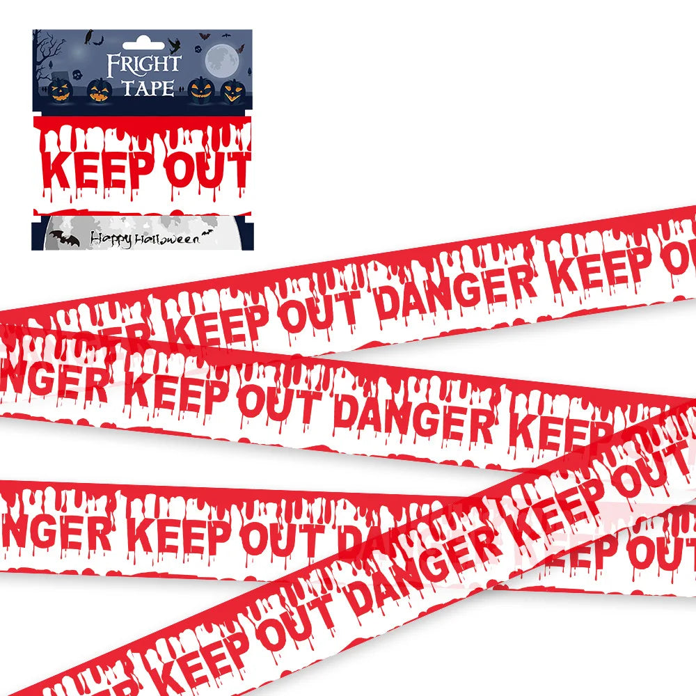 White barrier tape printed with dripping red keep out danger
