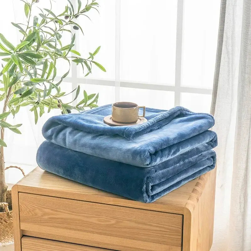 Solid Blue: the blanket folded in plain blue