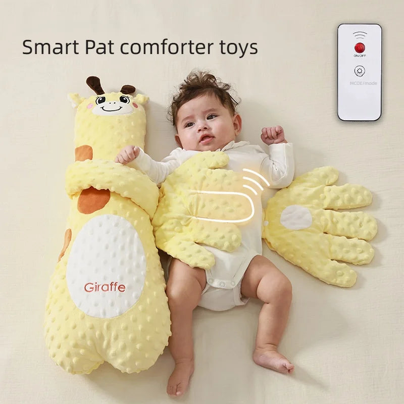 The yellow giraffe design lying beside a baby, with one plush palm across the baby and the two-button remote shown at the top right