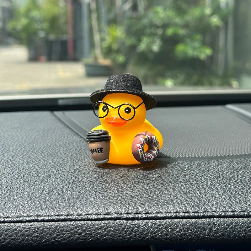 The black-hatted duck sitting on a car dashboard
