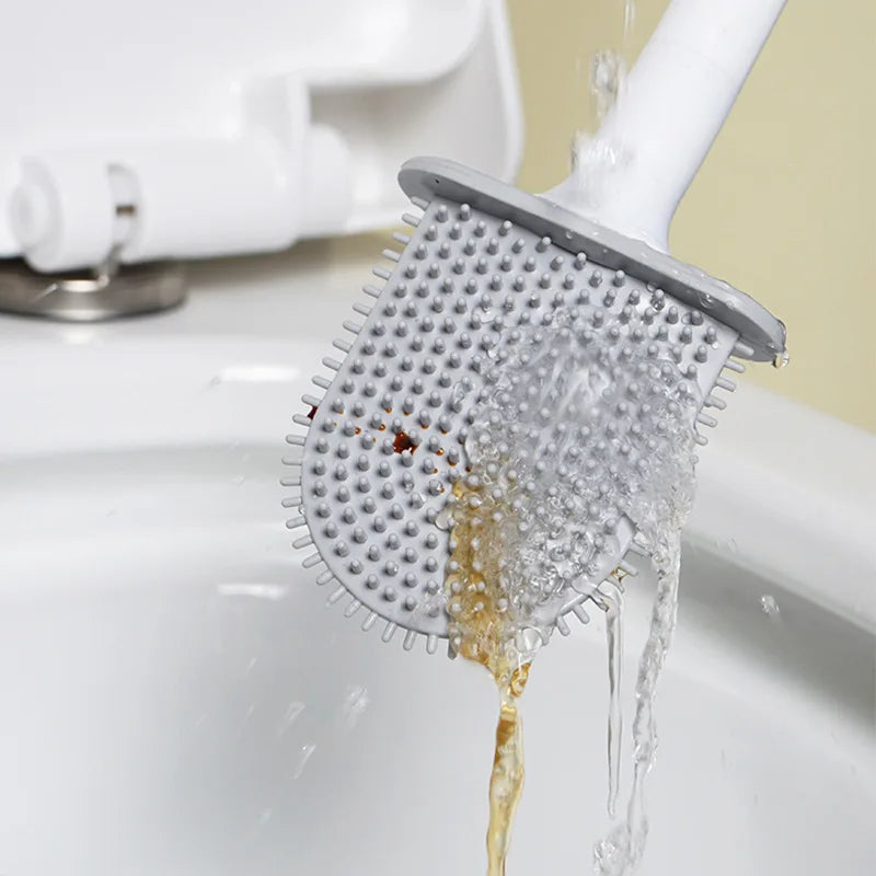 Silicone brush head rinsing clean under running water
