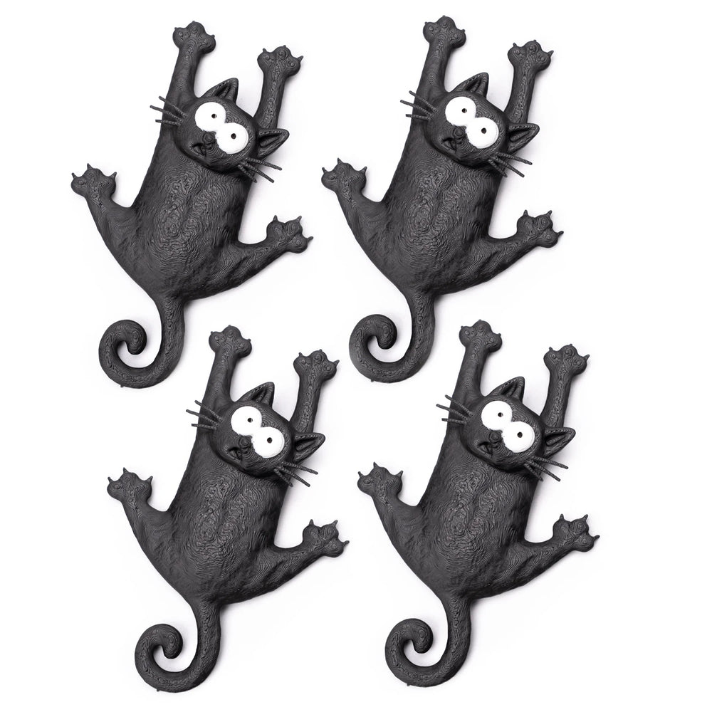 Pack of four black cat magnets