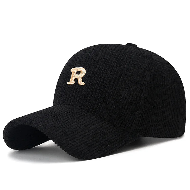 Black corduroy baseball cap with a cream 3D embroidered letter R