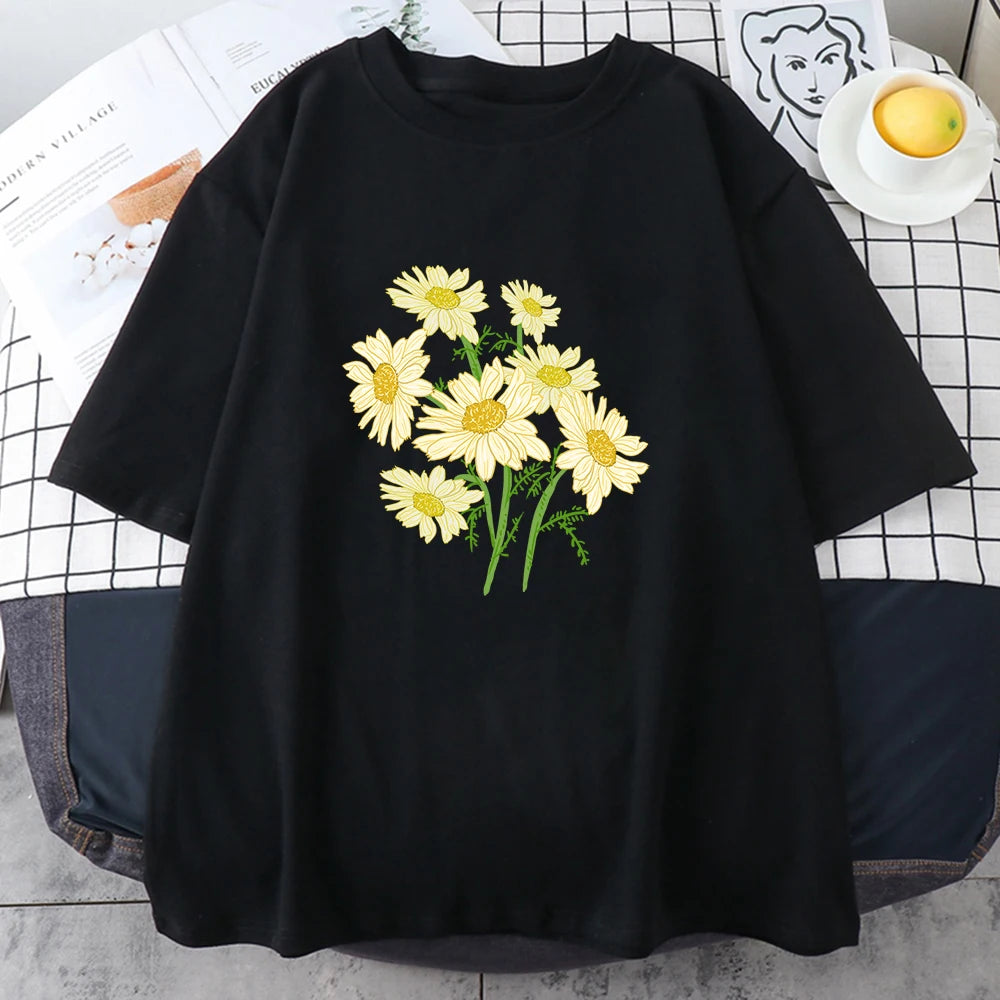 Black short-sleeve cotton t-shirt printed with a bouquet of yellow and cream daisy-like chrysanthemums