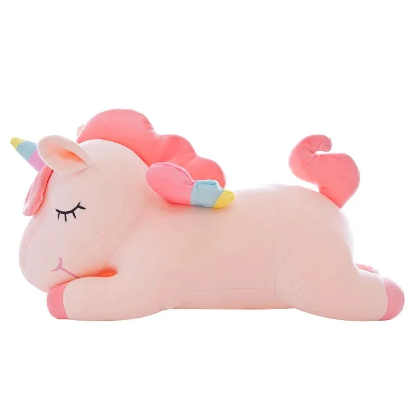 The pink unicorn from the side, showing the folded legs and short tail