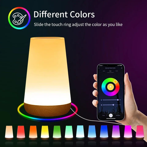 The lamp glowing warm white beside a phone showing a colour wheel, with a row of the same lamp in twelve different colours below