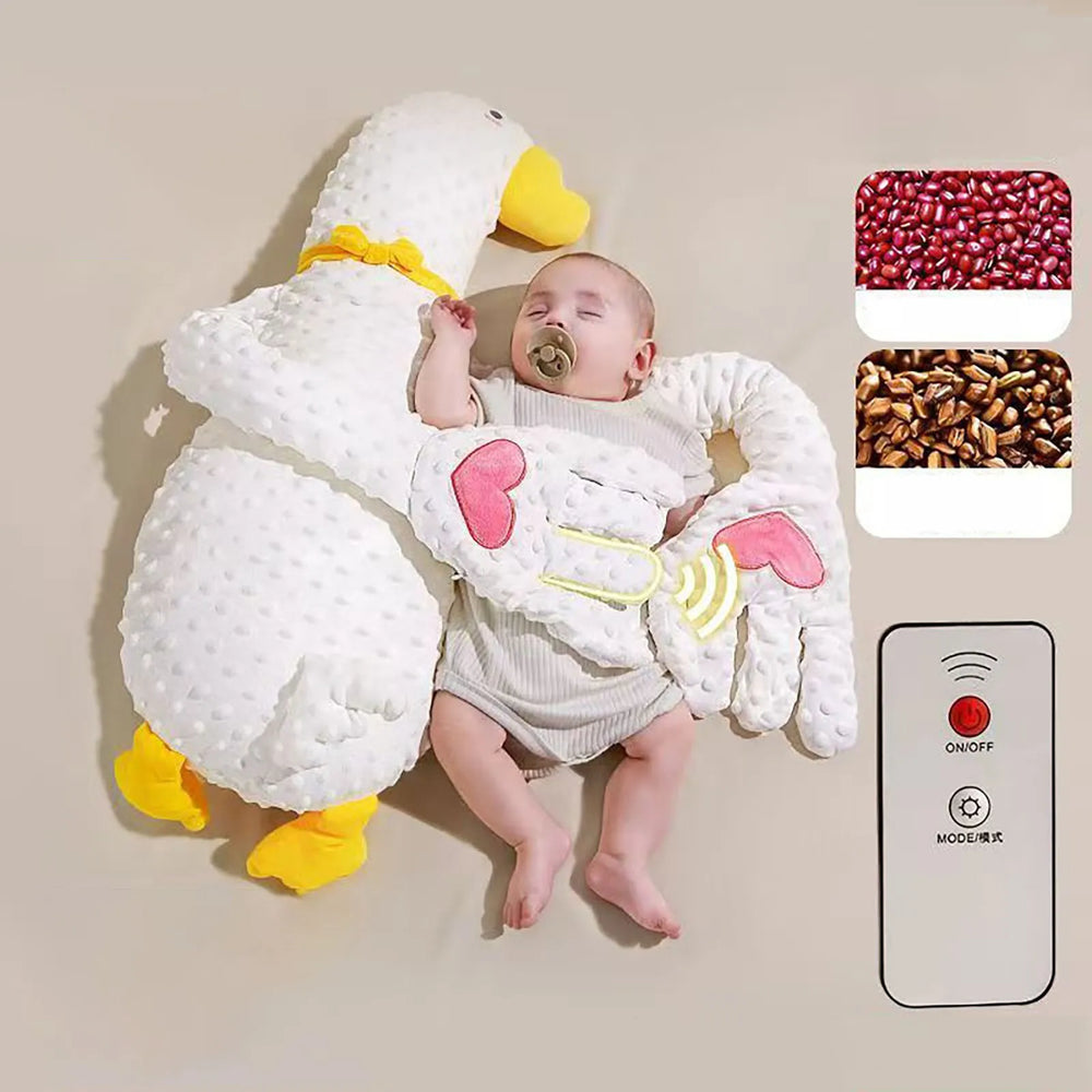 The Heart Palm Goose design, a white goose with a yellow bow and pink hearts on the palms, beside a sleeping baby, with the seed fillings and remote shown at the side