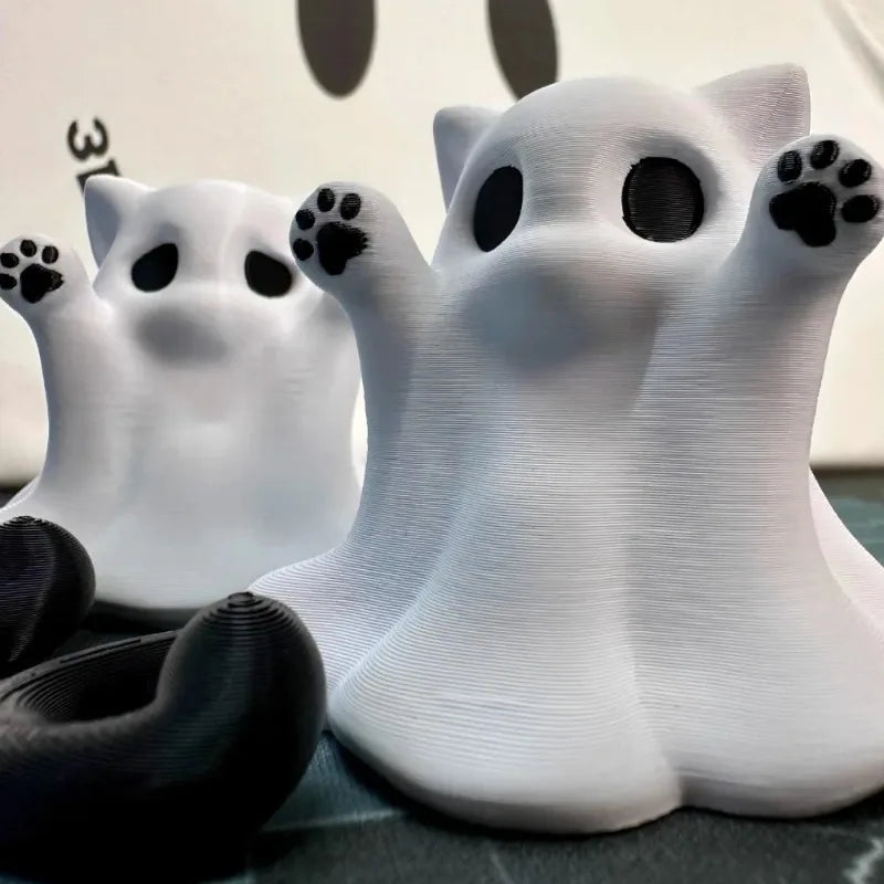 Close-up showing the printed layer lines across the sheet and the raised paws