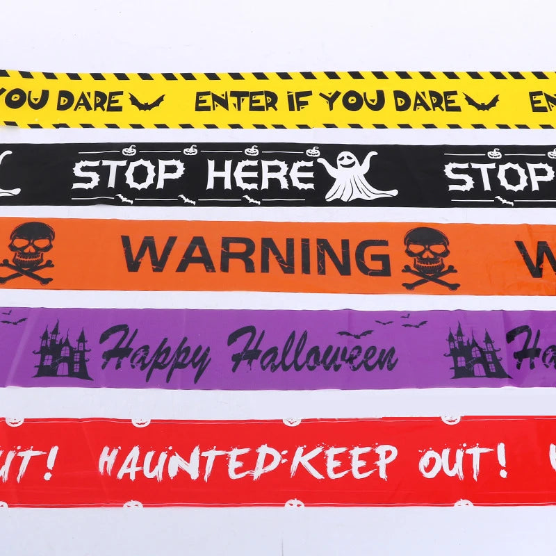 Halloween barrier tape, five printed designs laid side by side