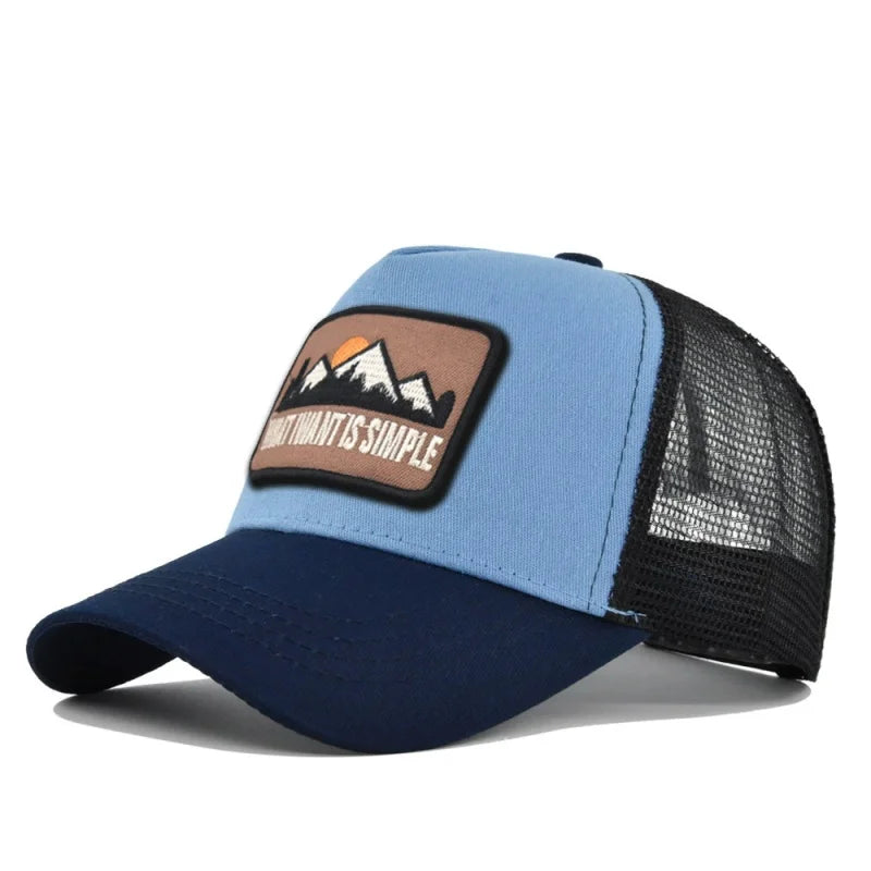 Sky blue crown with navy brim and black mesh