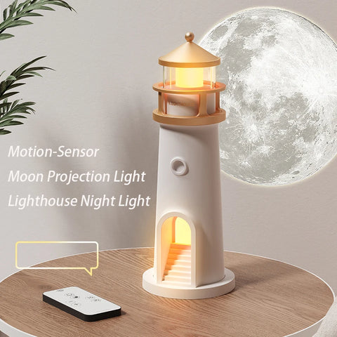 The white lighthouse night light lit on a round wooden table, its lantern room and doorway stairwell glowing warm, with a moon image on the wall behind and a slim remote beside it