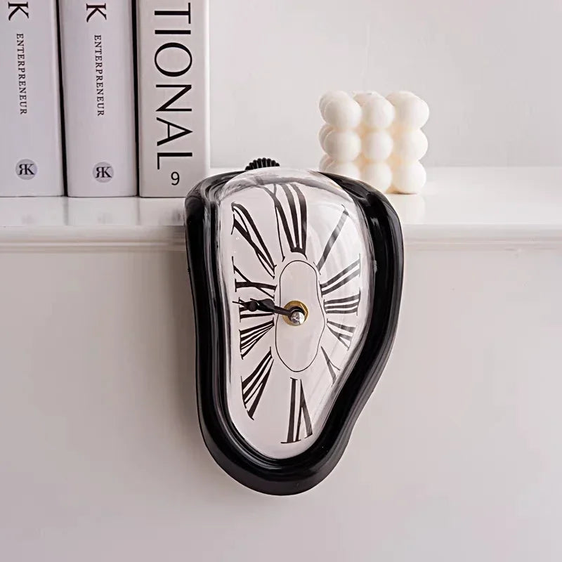 Black melting clock hanging over a shelf beside books