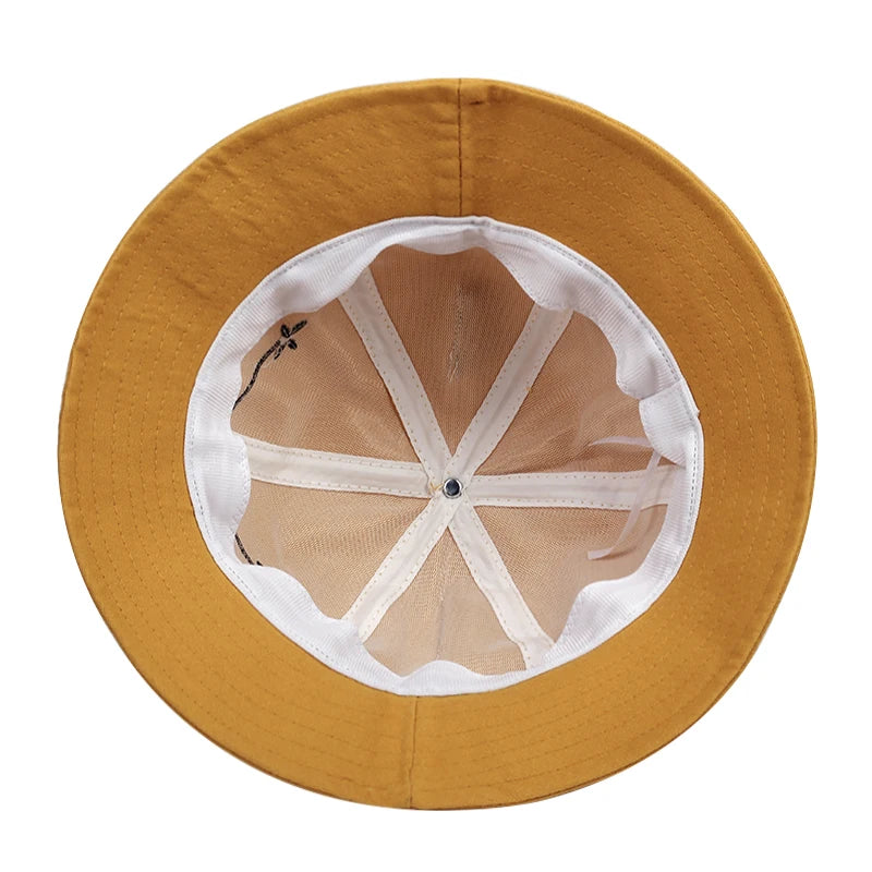 Inside of the bucket hat showing taped seams and an open mesh crown panel