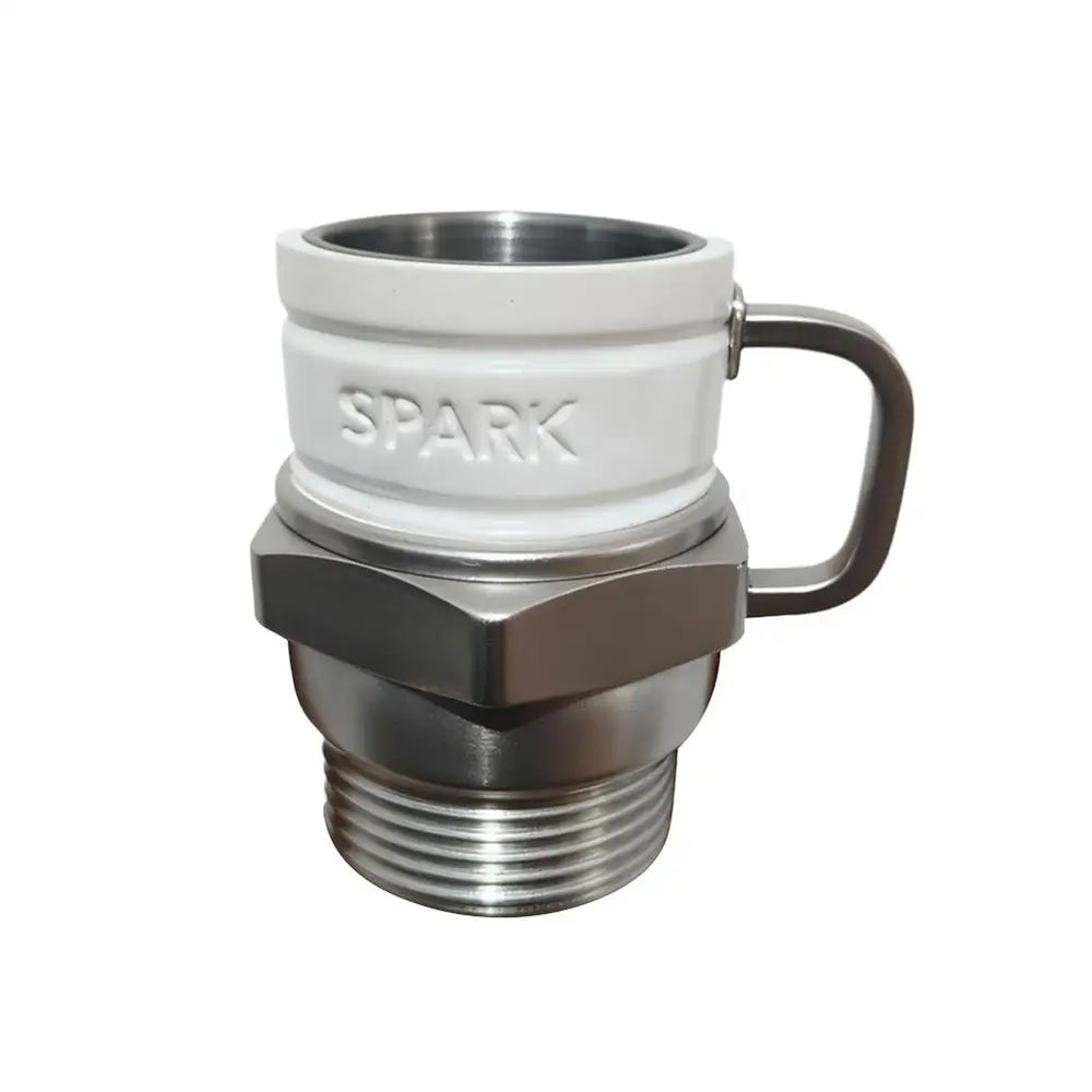 White ceramic and brushed metal coffee mug shaped like an oversized spark plug, with SPARK moulded into the ceramic and a threaded barrel for a base
