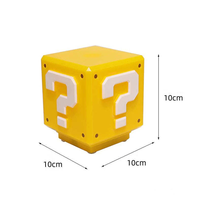 Dimension drawing of the yellow cube marked 10cm high, 10cm wide and 10cm deep