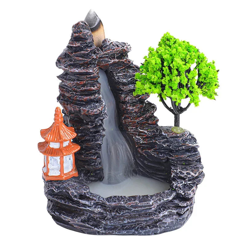 Backflow incense burner with orange pagoda and green tree on a white background