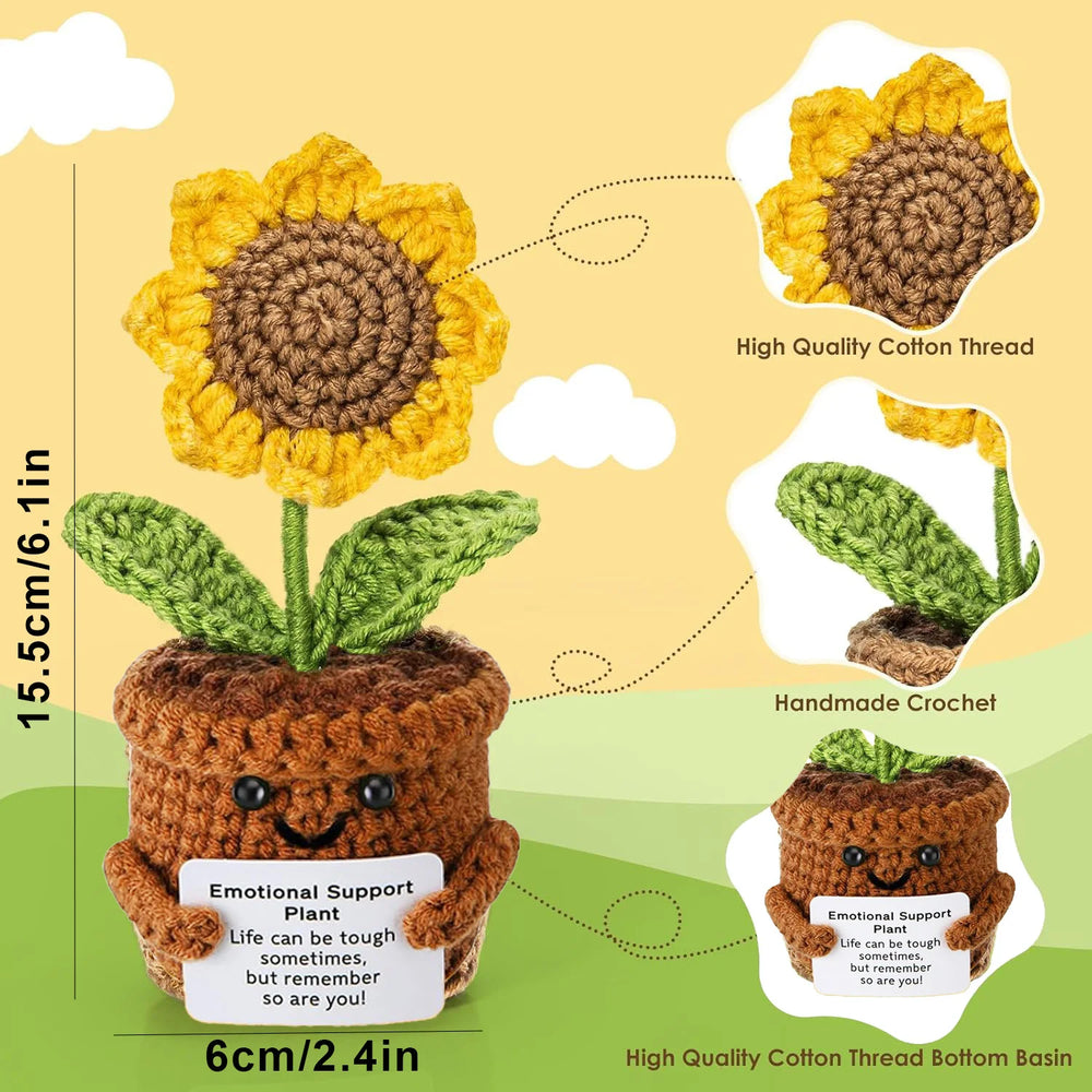 Crochet positive affirmation doll holding an encouragement card