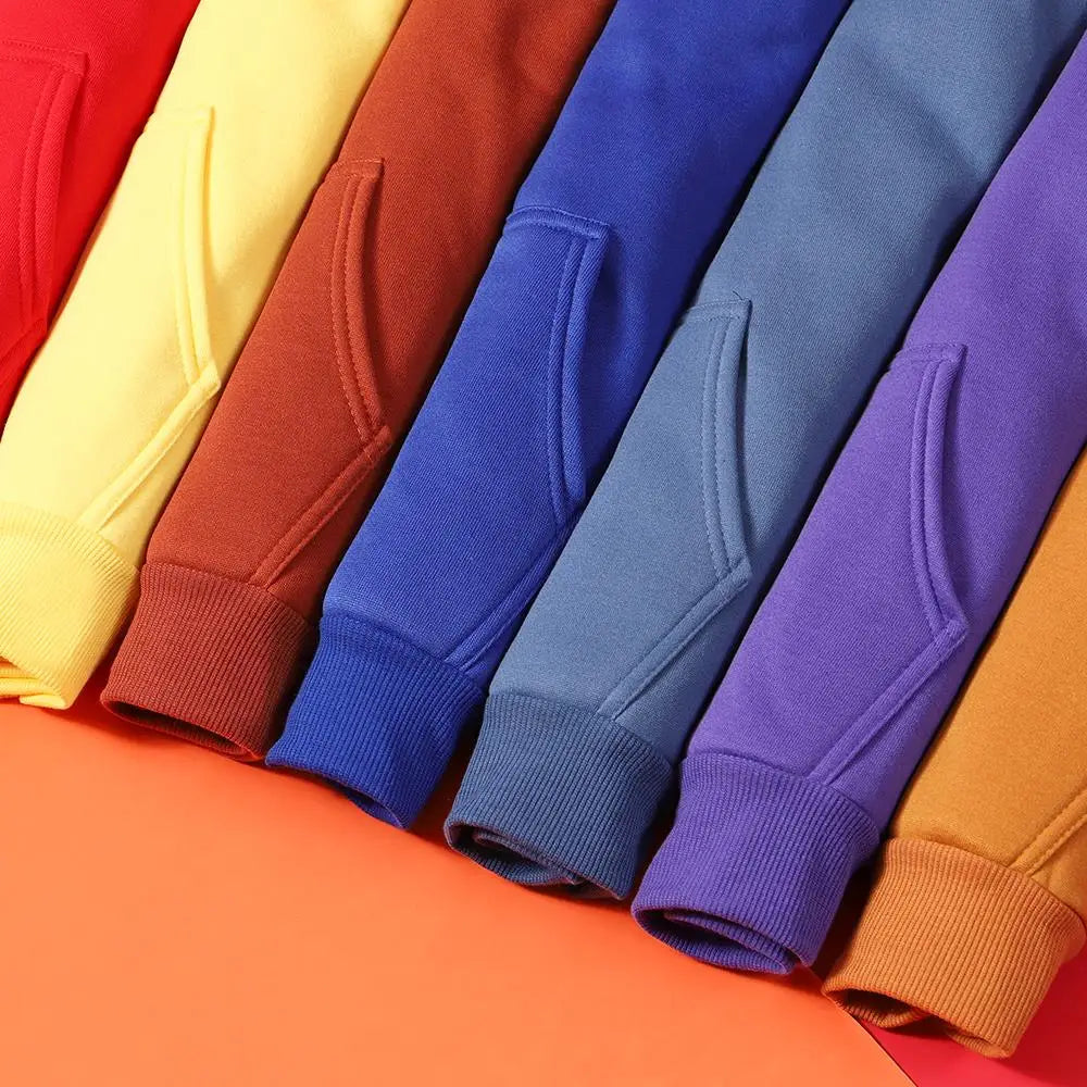 Sleeves of the hoodie fanned out in yellow, orange, red, blue and purple to show the colour range