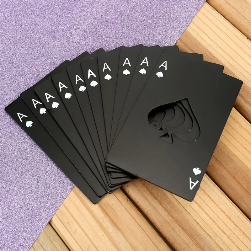 Single Black: a fan of black ace of spades cards on a wooden surface