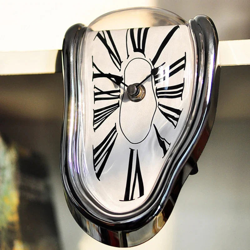 Close-up of the mirrored silver clock sagging off a shelf edge