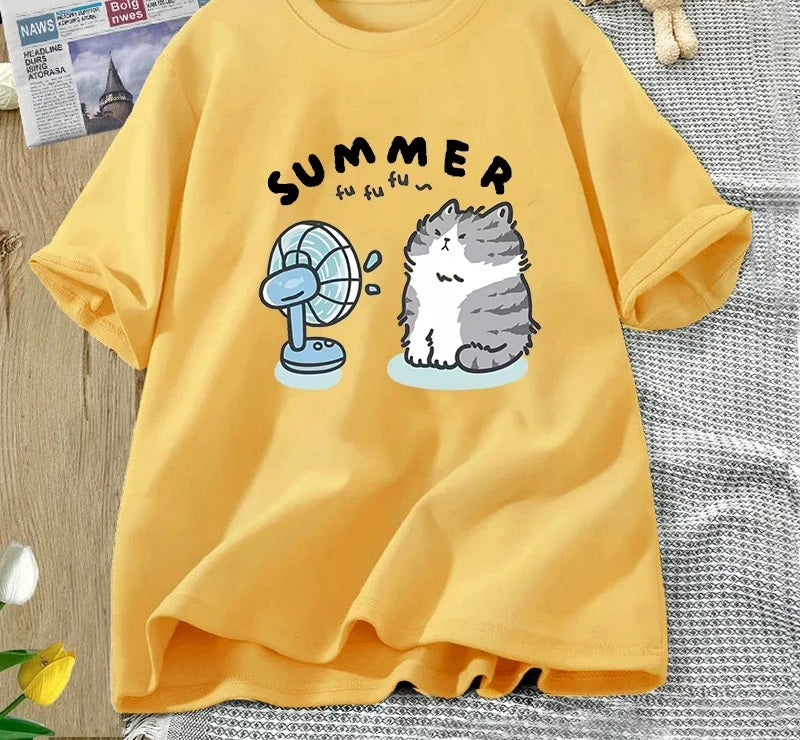 Summer cat and fan tee in yellow, chest print of a cartoon cat cooling off in front of an electric fan